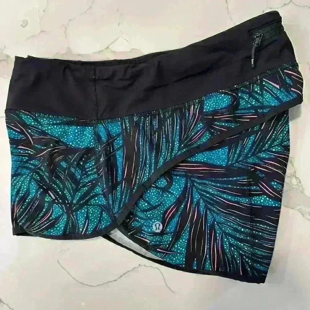 Lululemon Speed Short Palm Lace Tofino Teal Multi / Black
Size 8